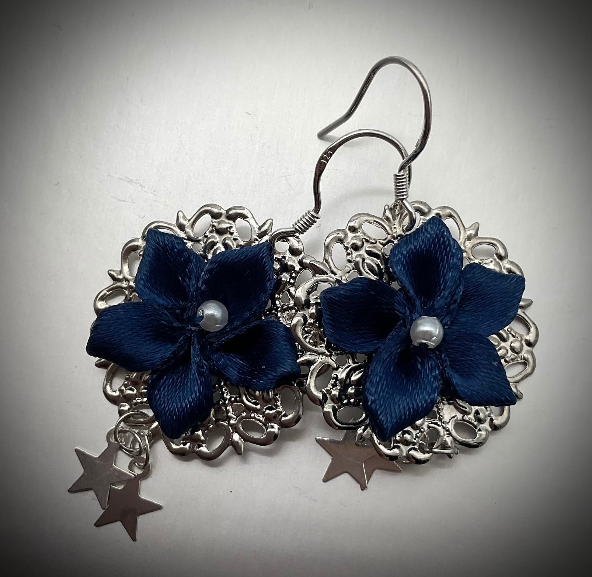 Blue Flower Poinsettia Holiday Christmas Round Silver Dangle Earrings with Star Accents