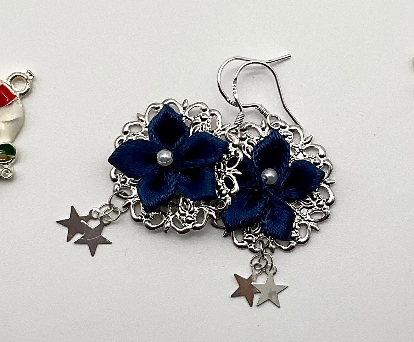 Blue Flower Poinsettia Holiday Christmas Round Silver Dangle Earrings with Star Accents