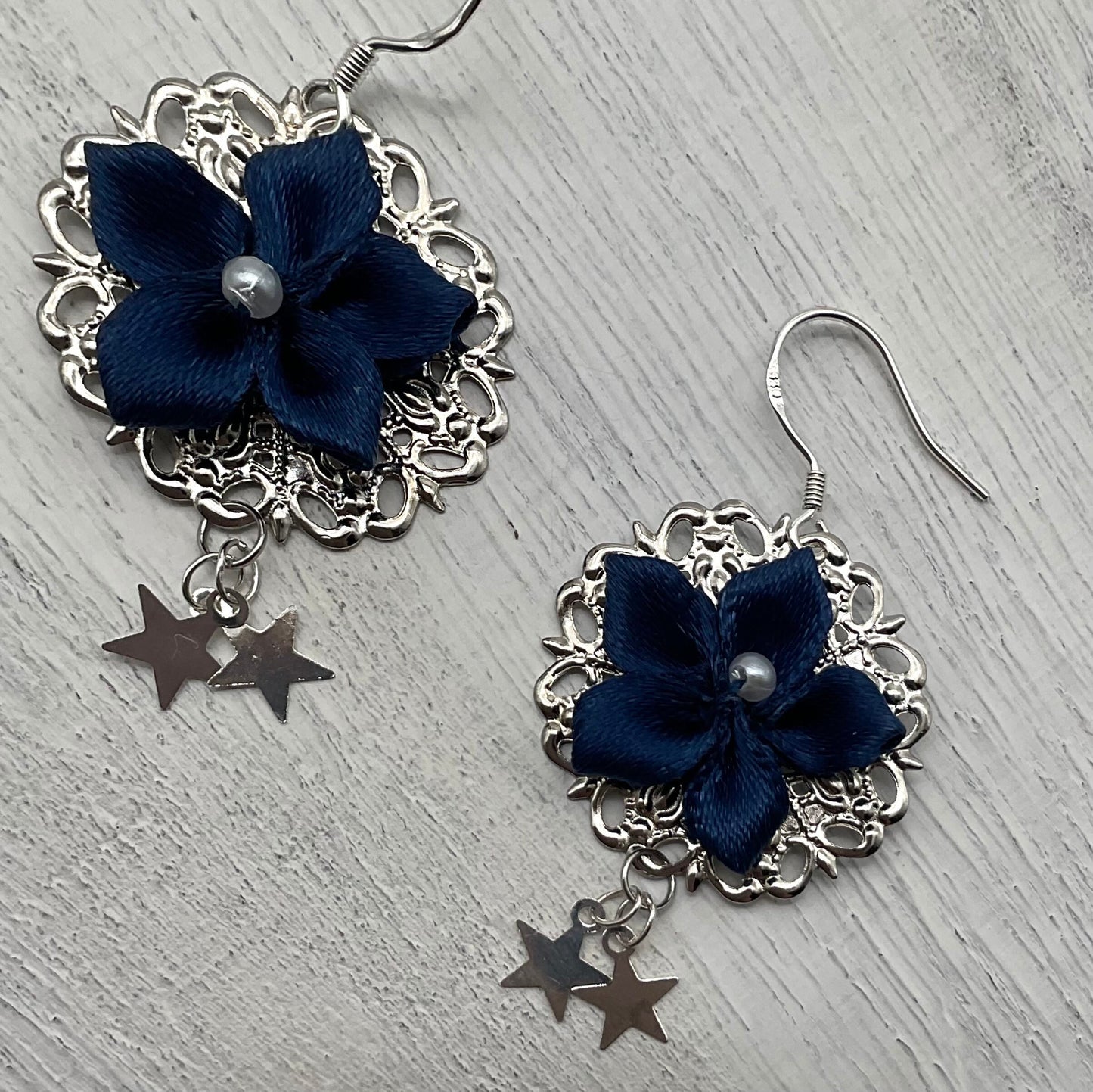 Blue Flower Poinsettia Holiday Christmas Round Silver Dangle Earrings with Star Accents