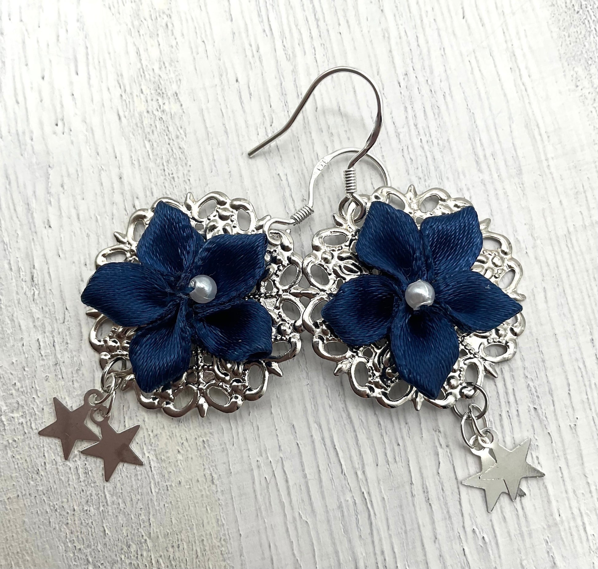 Blue Flower Poinsettia Holiday Christmas Round Silver Dangle Earrings with Star Accents