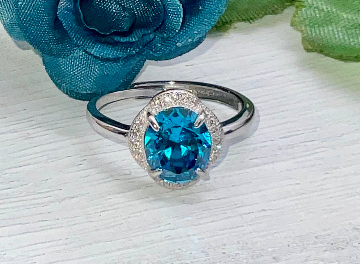 London Blue Topaz Oval Shaped Sterling Silver Adjustable Ring with CZ Accents - December Birthstone