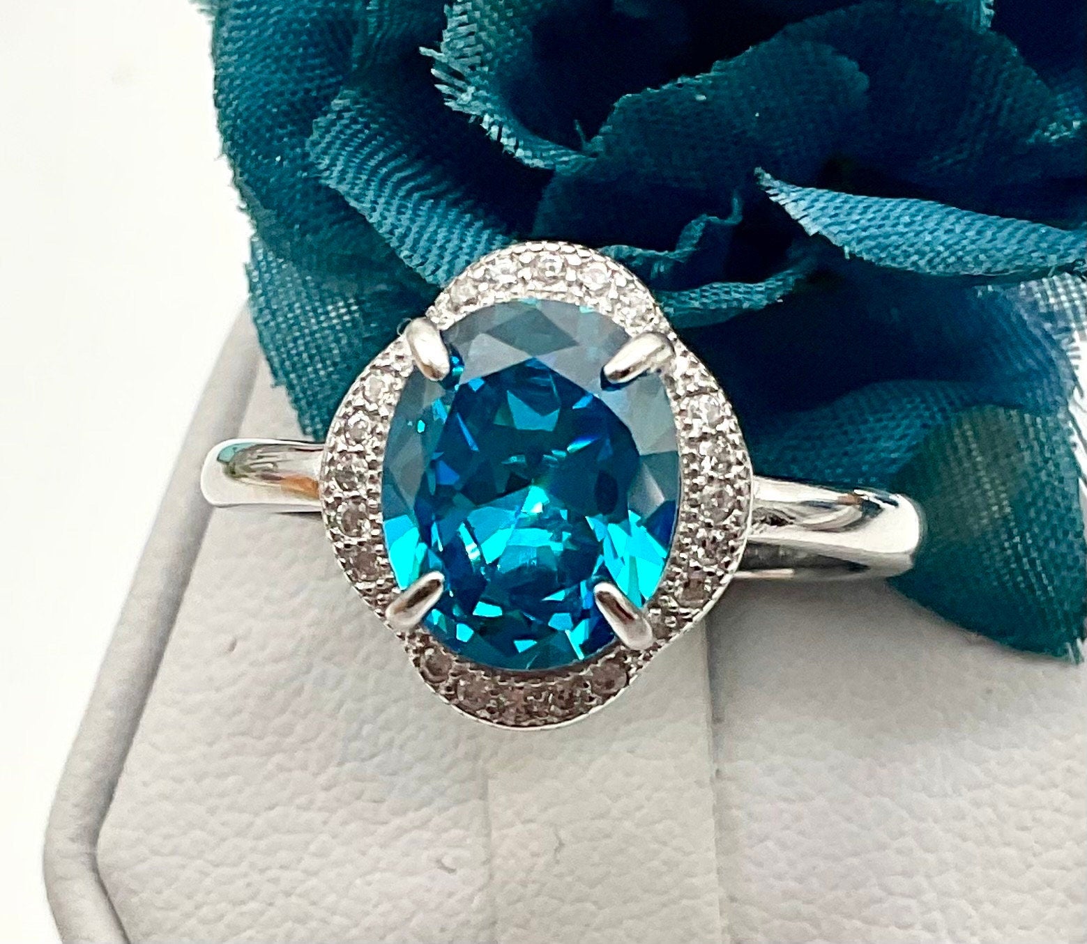 London Blue Topaz Oval Shaped Sterling Silver Adjustable Ring with CZ Accents - December Birthstone