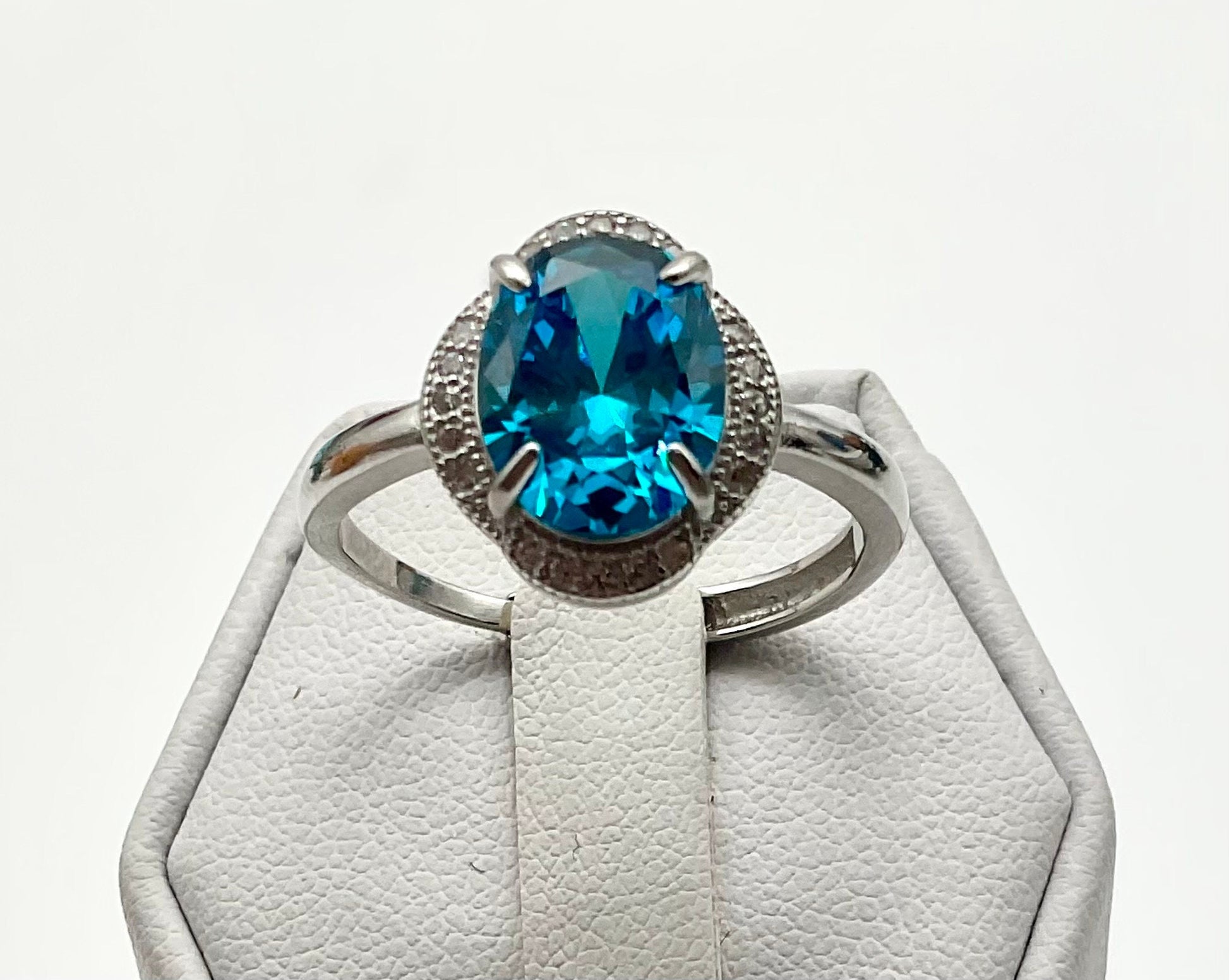 London Blue Topaz Oval Shaped Sterling Silver Adjustable Ring with CZ Accents - December Birthstone